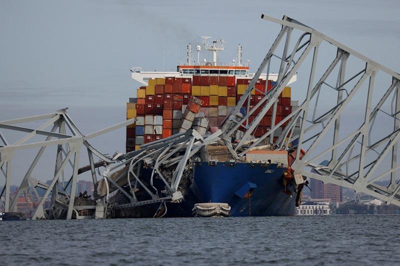Six workers presumed dead after cargo ship knocks down Baltimore bridge