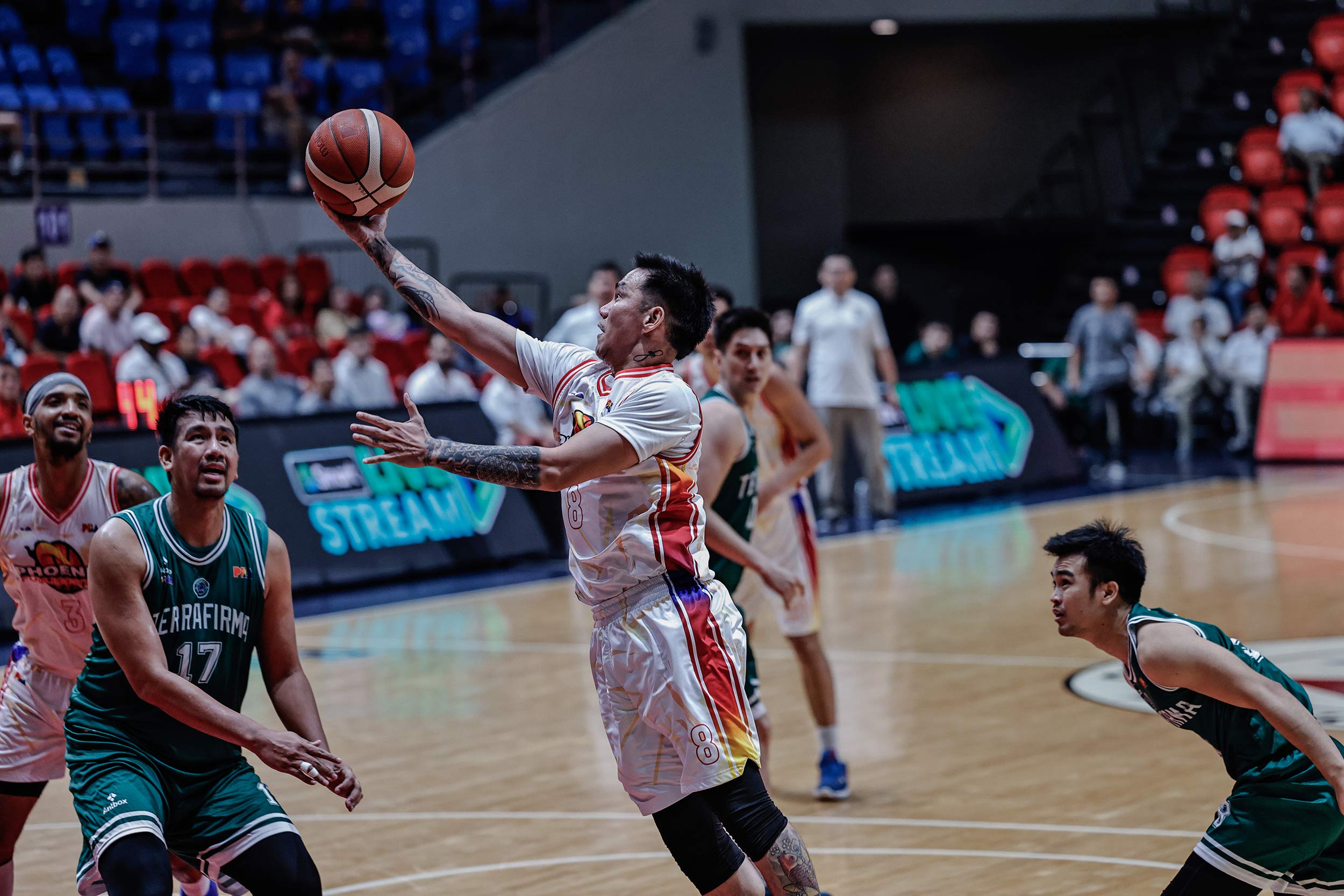RR Garcia posts double-double as Phoenix rises vs. Terrafirma for first win