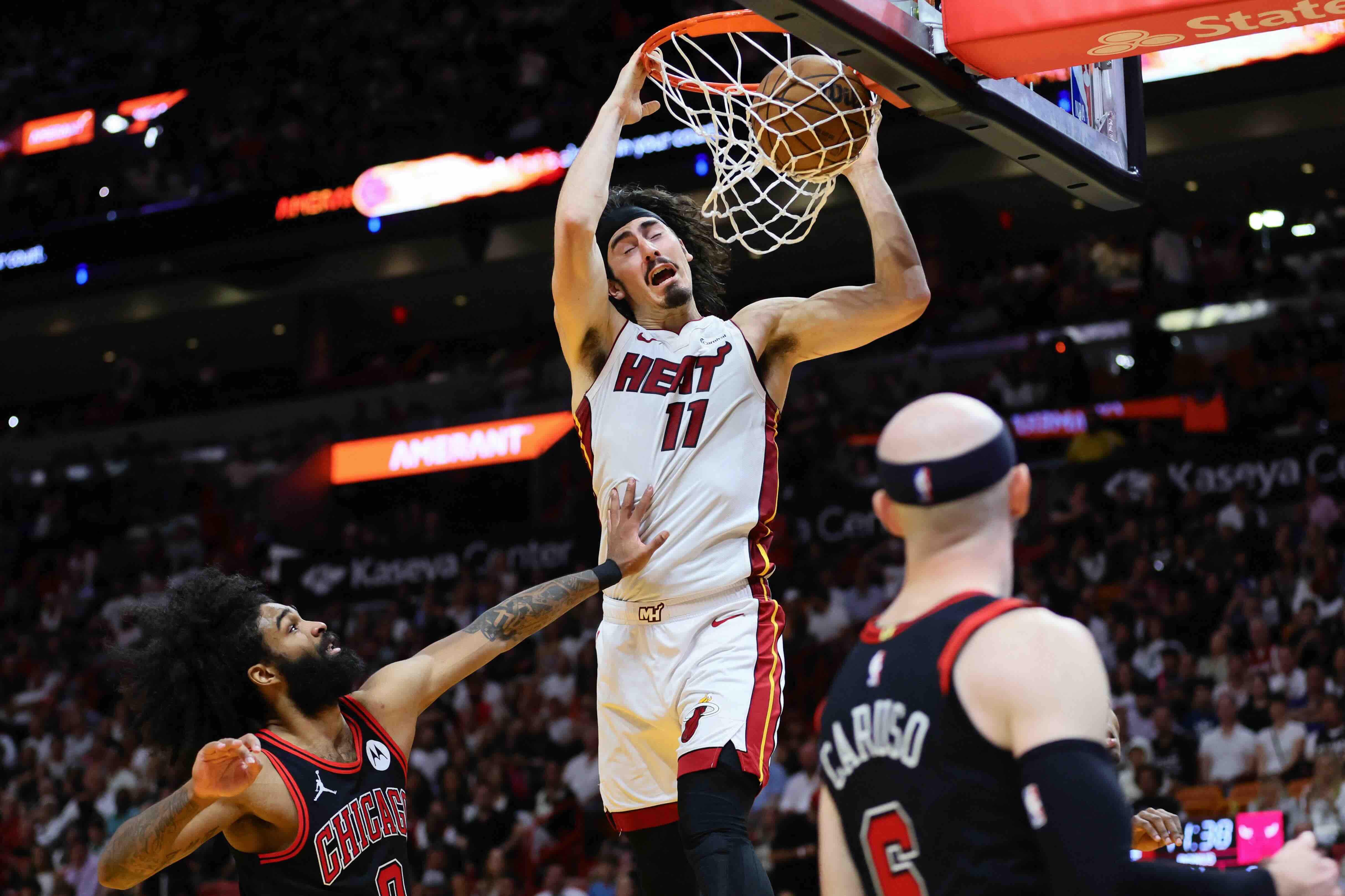 NBA: Heat dispose of Bulls, claim East playoff berth