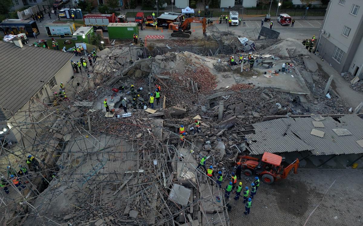 Rescuers search for survivors after South Africa building collapse