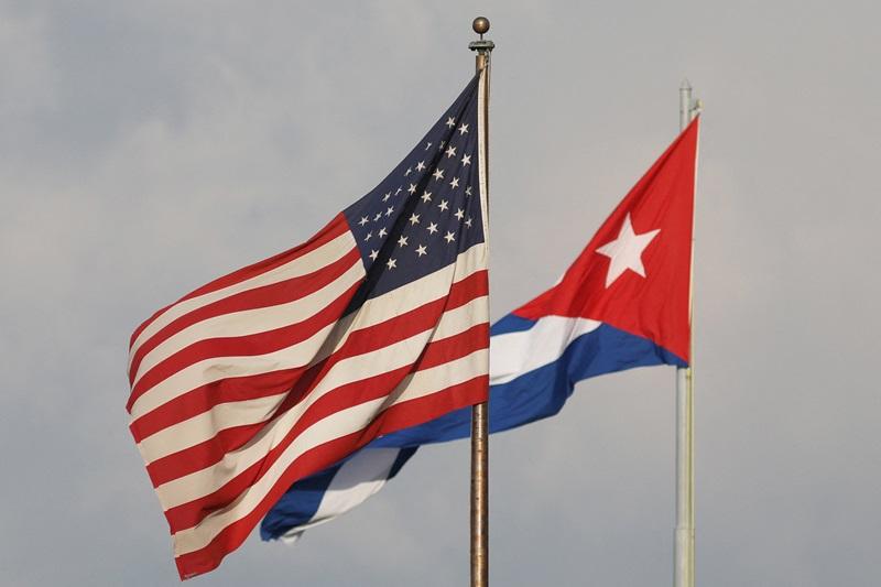 The US and Cuban flags seen in Havana, Cuba