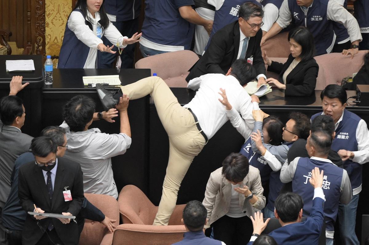 Taiwan lawmakers exchange blows in bitter dispute over parliament reforms