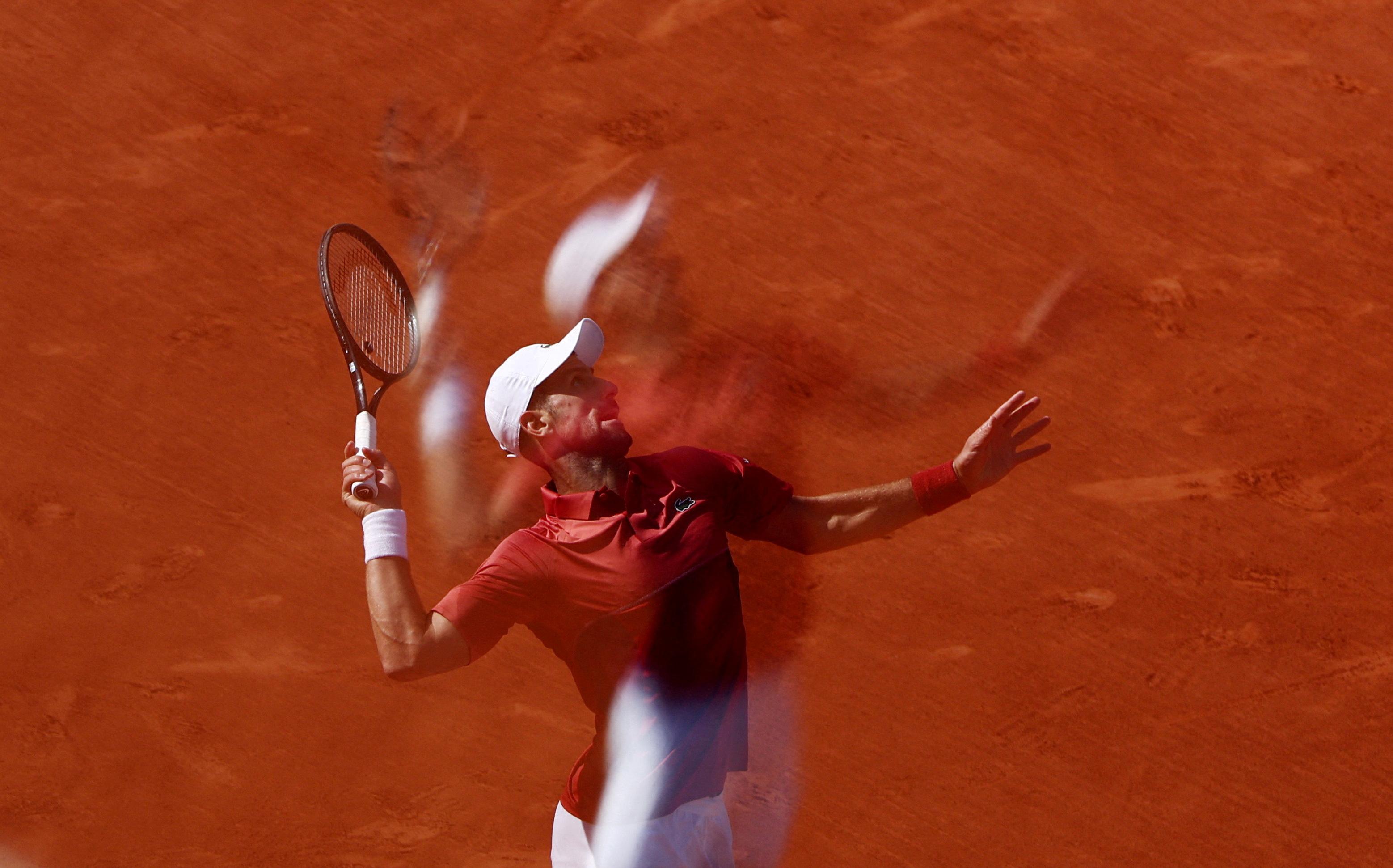 Novak Djokovic endures another French Open marathon, survives Cerundolo