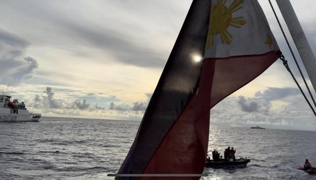 A Philippine flag flutters proudly at the back of BRP Teresa Magbanua amid increased Chinese presence in Escoda Shoal.