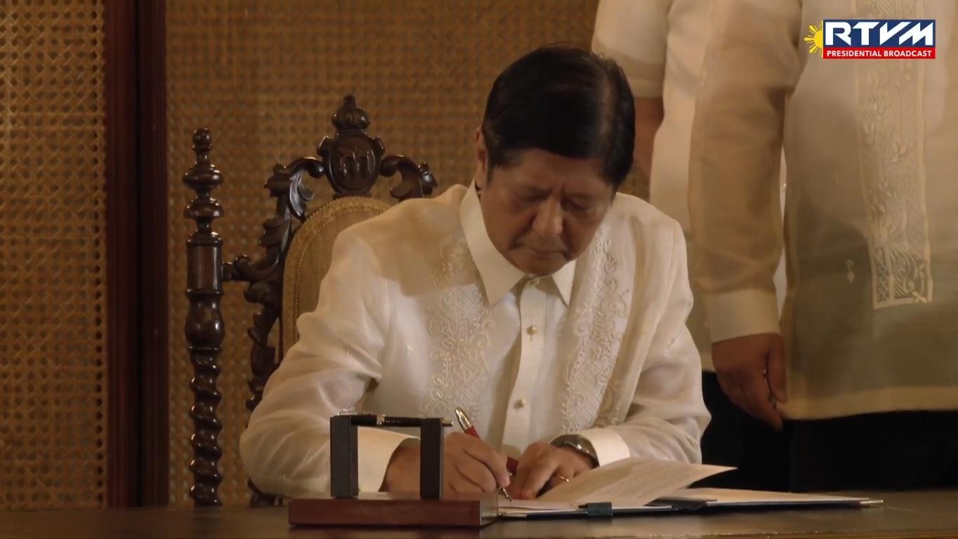 Marcos signs law giving public school teachers allowance
