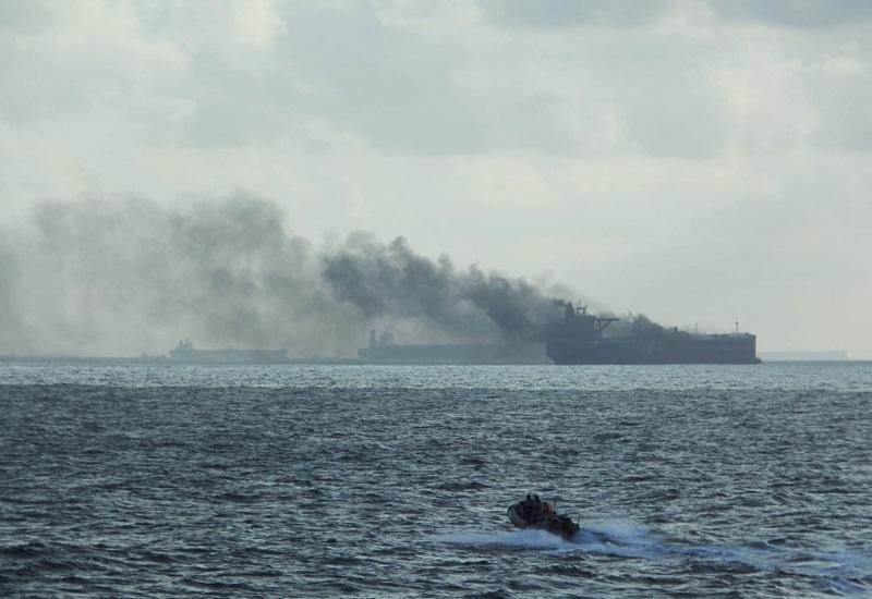 Oil tankers on fire after colliding close to Singapore, crew rescued