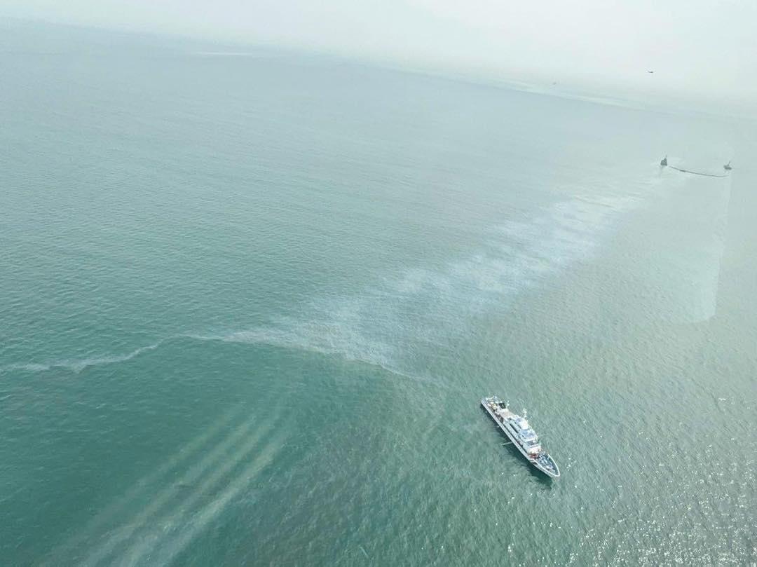 An aerial view shows the waters in Bataan affected by an oil spill on Saturday, July 27, 2024