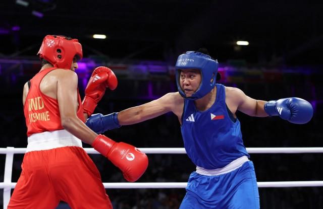 Paris 2024 Olympics - Boxing - July 30, 2024. Nesthy Petecio of Philippines in action against Jaismine of India. REUTERS/Maye-E Wong - Cignal TV/One Sports