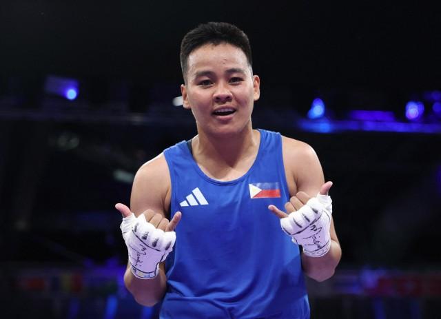 Paris 2024 Olympics - Boxing - July 30, 2024. Nesthy Petecio of Philippines celebrates winning her fight against Jaismine of India. REUTERS/Maye-E Wong - Cignal TV/One Sports
