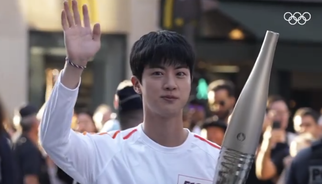 Jin of BTS carries the Olympic torch, serves as South Korea’s