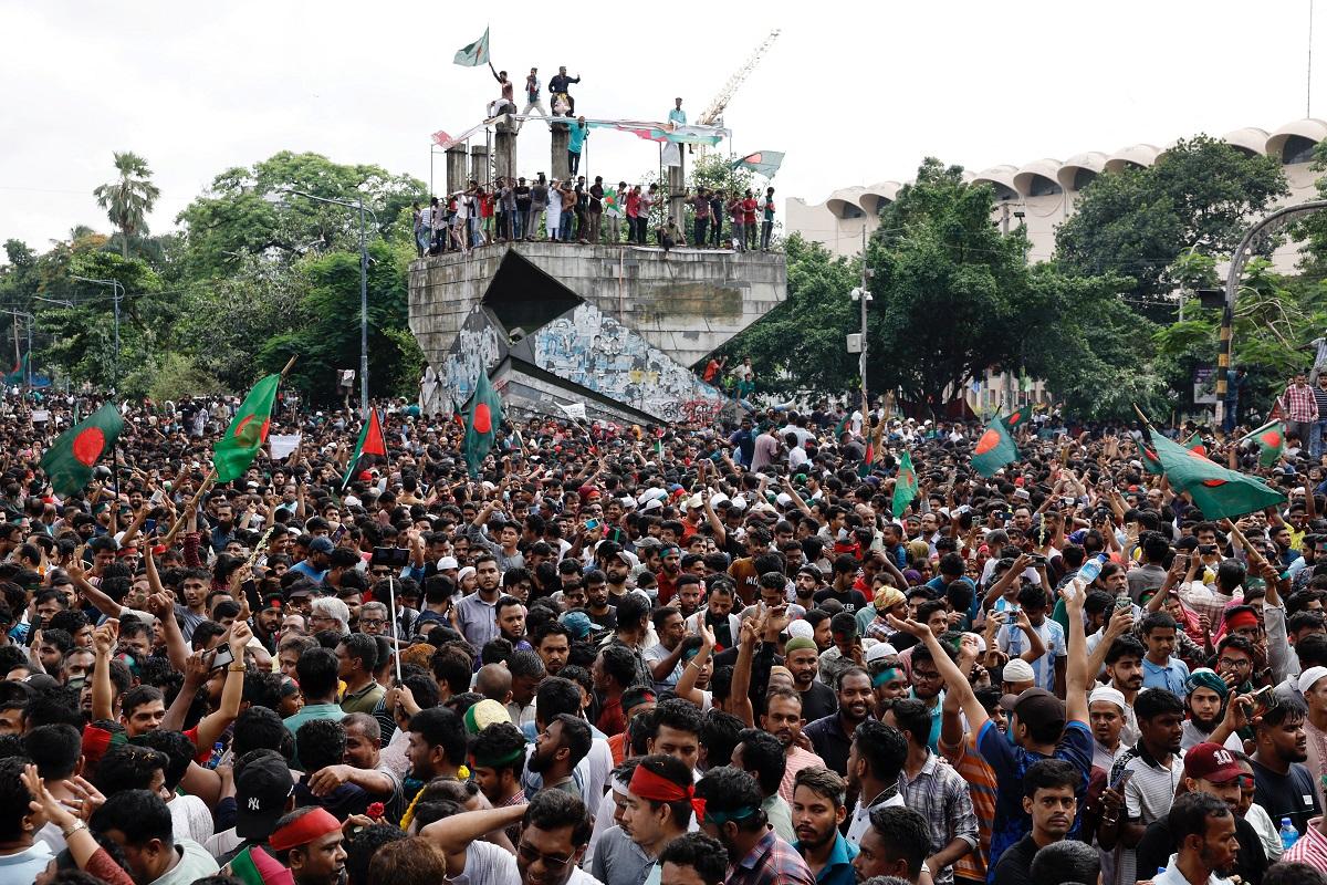 People celebrate the resignation of Bangladeshi Prime Minister Sheikh Hasina