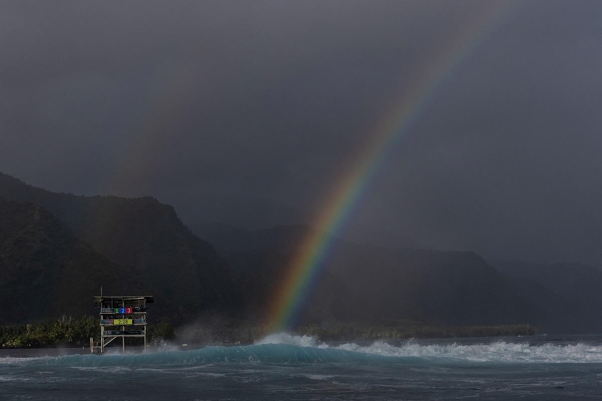 A rainbow forms next to the judge's tower for the Paris 2024 Olympics surfing competition in Teahupo'o, Tahiti, French Polynesia, July 27, 2024. REUTERS/ Carlos Barria