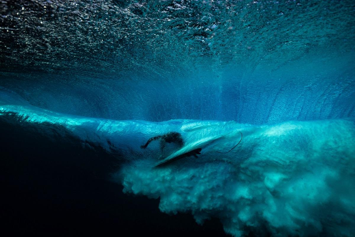 A surfer rides a wave at the Paris 2024 Olympics surfing site in Teahupo'o, Tahiti, French Polynesia, August 6, 2024. REUTERS/ Carlos Barria