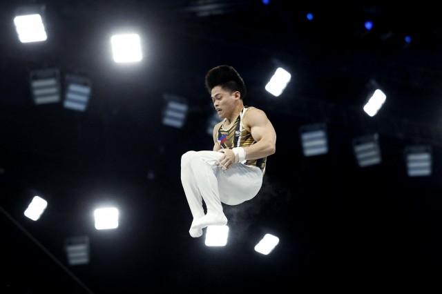 Paris 2024 Olympics - Artistic Gymnastics  - July 31, 2024. Carlos Edriel Yulo of Philippines in action on the Horizontal Bar. REUTERS/Peter Cziborra