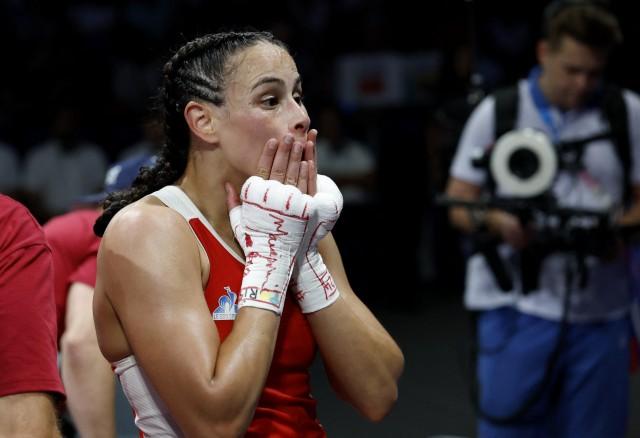 Paris 2024 Olympics - Boxing - Women's 57kg - Prelims - Round of 16- August 02, 2024. Amina Zidani of France reacts after losing her fight against Nesthy Petecio of Philippines. REUTERS/Peter Cziborra