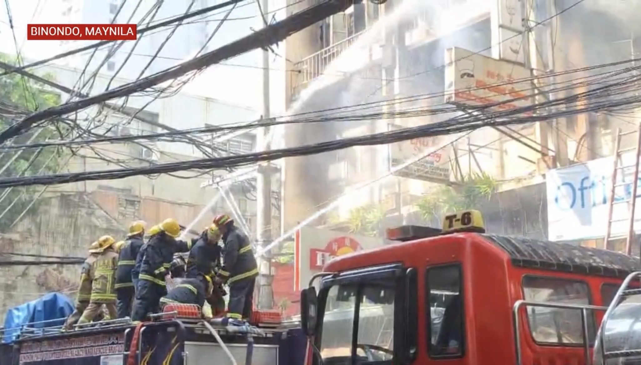 Eleven people were reported dead in a fire that hit a four-storey commercial-residential building in Binondo, Manila Friday morning,