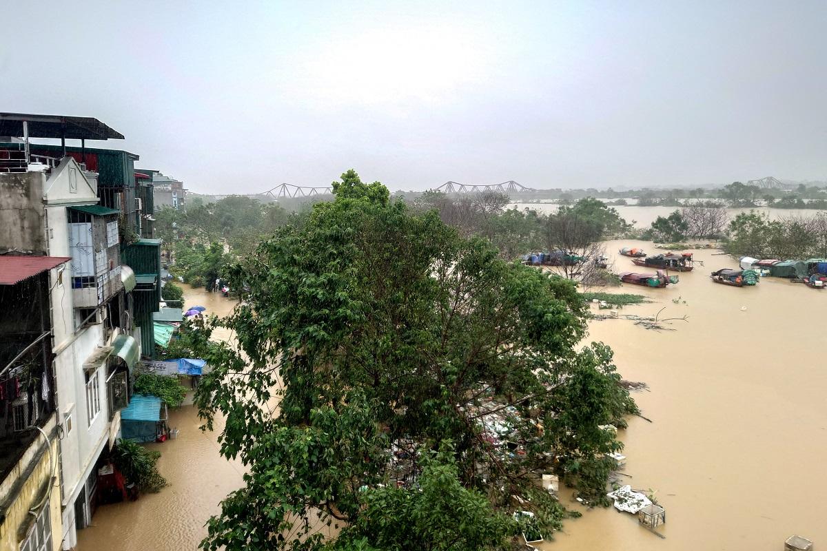 Hanoi flooded by swollen river as Typhoon Yagi leaves 155 dead