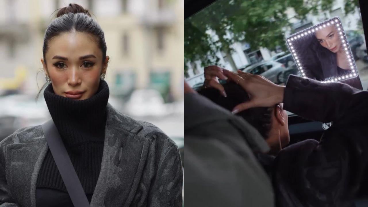 Heart Evangelista gets camera ready inside a moving car during Milan Fashion Week