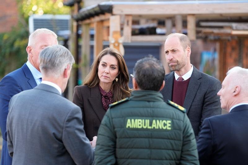 Princess Kate joins husband William on visit to town hit by killings, riot