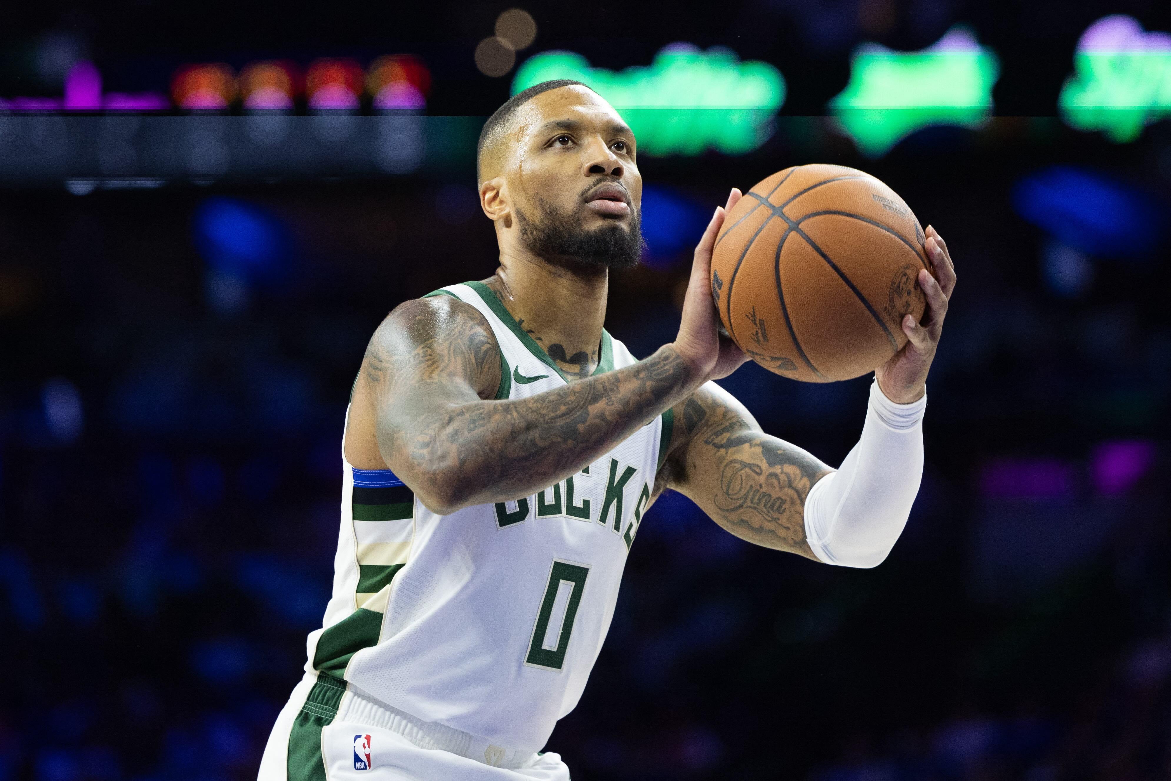 NBA Damian Lillard Bucks pull away for opening win over 76ers GMA News Online