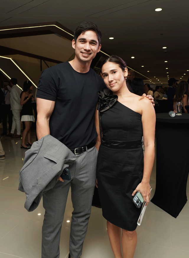 Local personalities Oliver Moeller and Mariana Valera are seen at the grand opening of the 4th mall in Cebu, taking in the lively atmosphere and enjoying the festivities.