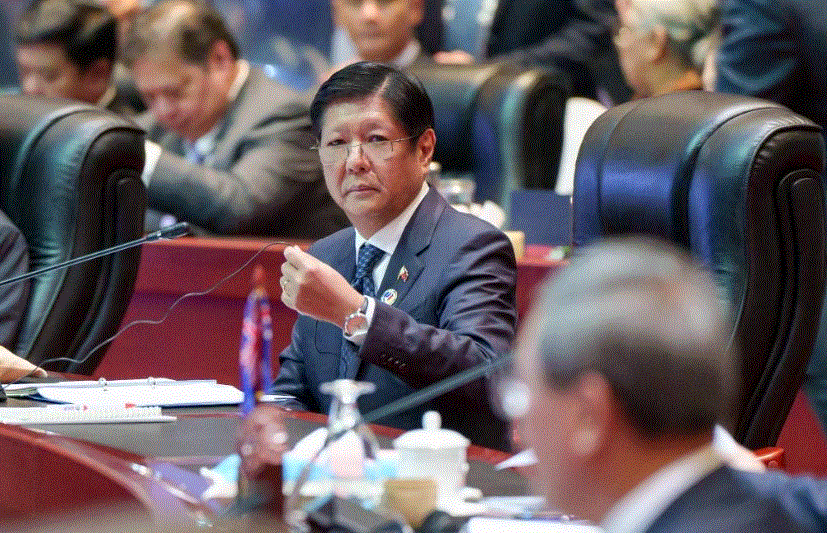 Marcos on way home from Lao PDR after ASEAN, related summits