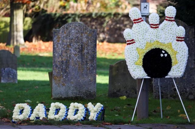 Themed floral tributes for former One Direction singer Liam Payne are seen outside St. Mary's Church on the day of his funeral, in Amersham, near London, November 20, 2024. REUTERS/ Toby Melville