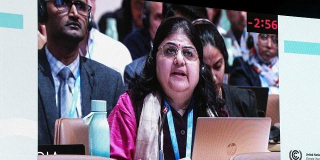 A screen displays Chandni Raina of India, as she speaks during a closing plenary meeting at the COP29 United Nations Climate Change Conference, in Baku, Azerbaijan November 24, 2024. REUTERS/Murad Sezer