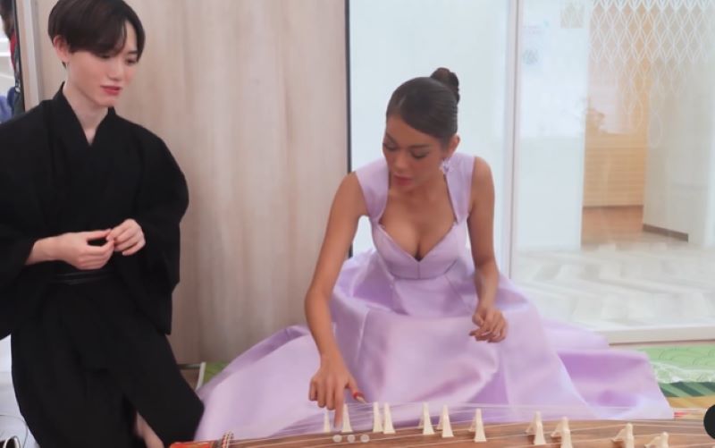 Angelica Lopez tries playing a Japanese zither in Miss International 2024