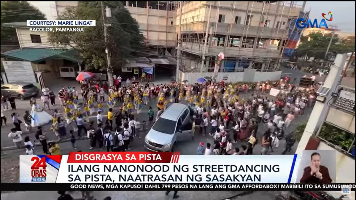 Car rolls backward, hits street dancing spectators in Pampanga
 thumbnail