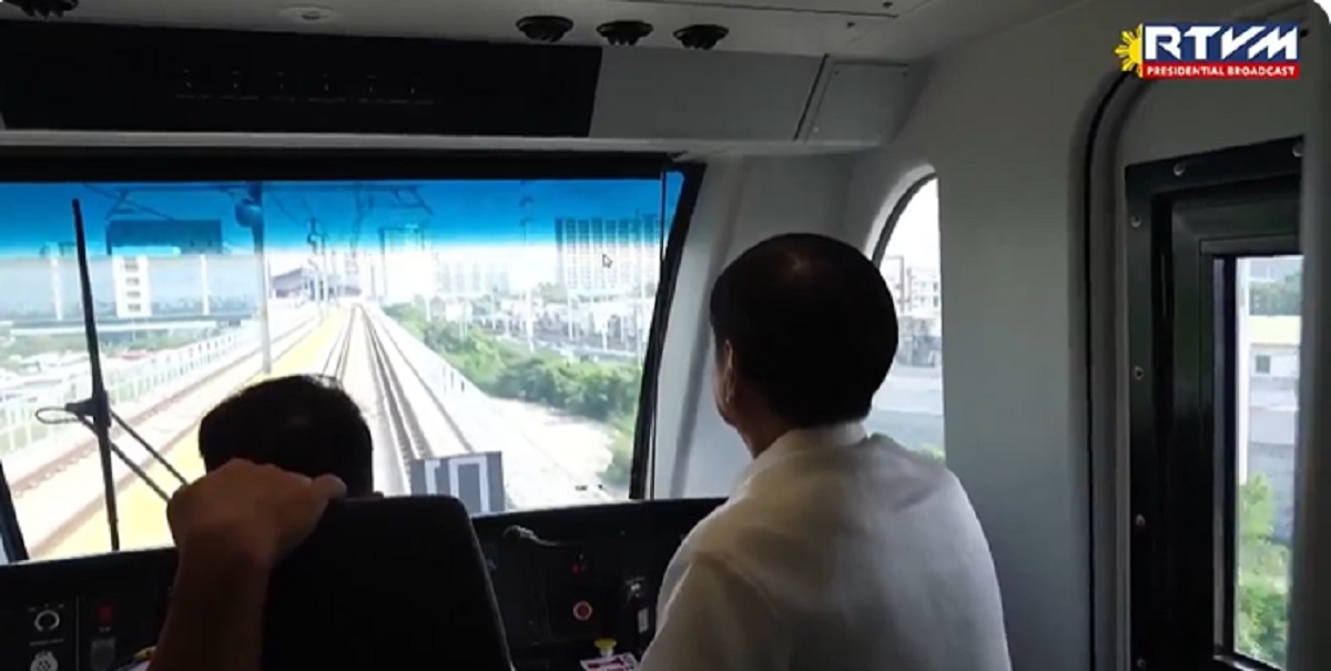 Marcos rides train at LRT1 Cavite extension launch