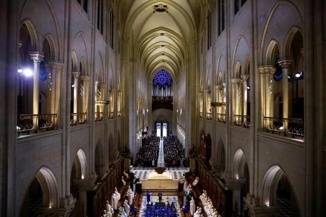 General view of the nave during the inaugural Mass, with the consecration of the high altar, at the Notre-Dame de Paris Cathedral. REUTERS/ Sarah Meyssonnier/ Pool