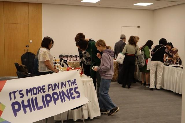 The Philippines presented two booths at the International Embassies Charity Market 2024 in Prague, including a sari-sari store-inspired table teeming with dried mangoes, instant noodles, canned sardines, banig and woven bags, small parol Christmas tree d&Atilde;&copy;cor, and the pearl collection. Andy Pe&Atilde;&plusmn;afuerte III