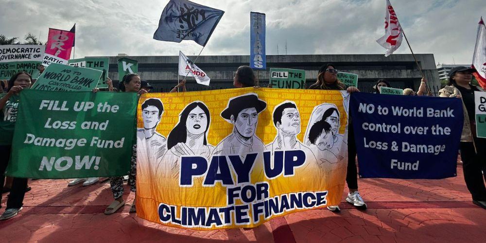 More than 200 Filipinos mobilize in front of PICC at Board of Loss and Damage Fund's 1st meeting in Manila