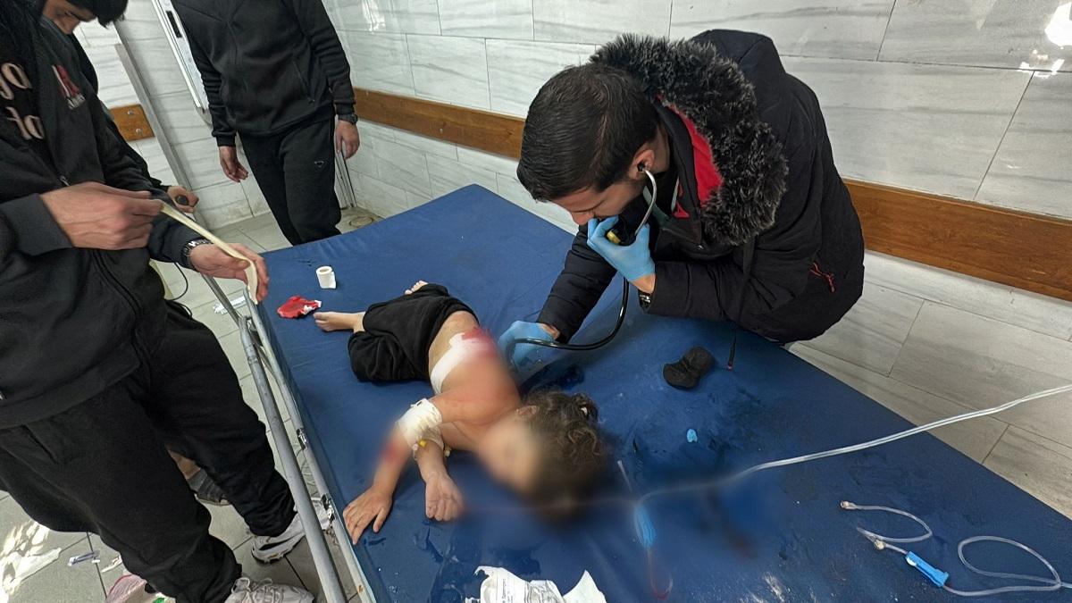 Gaza medics struggle to rescue patients after Israel orders hospital evacuated