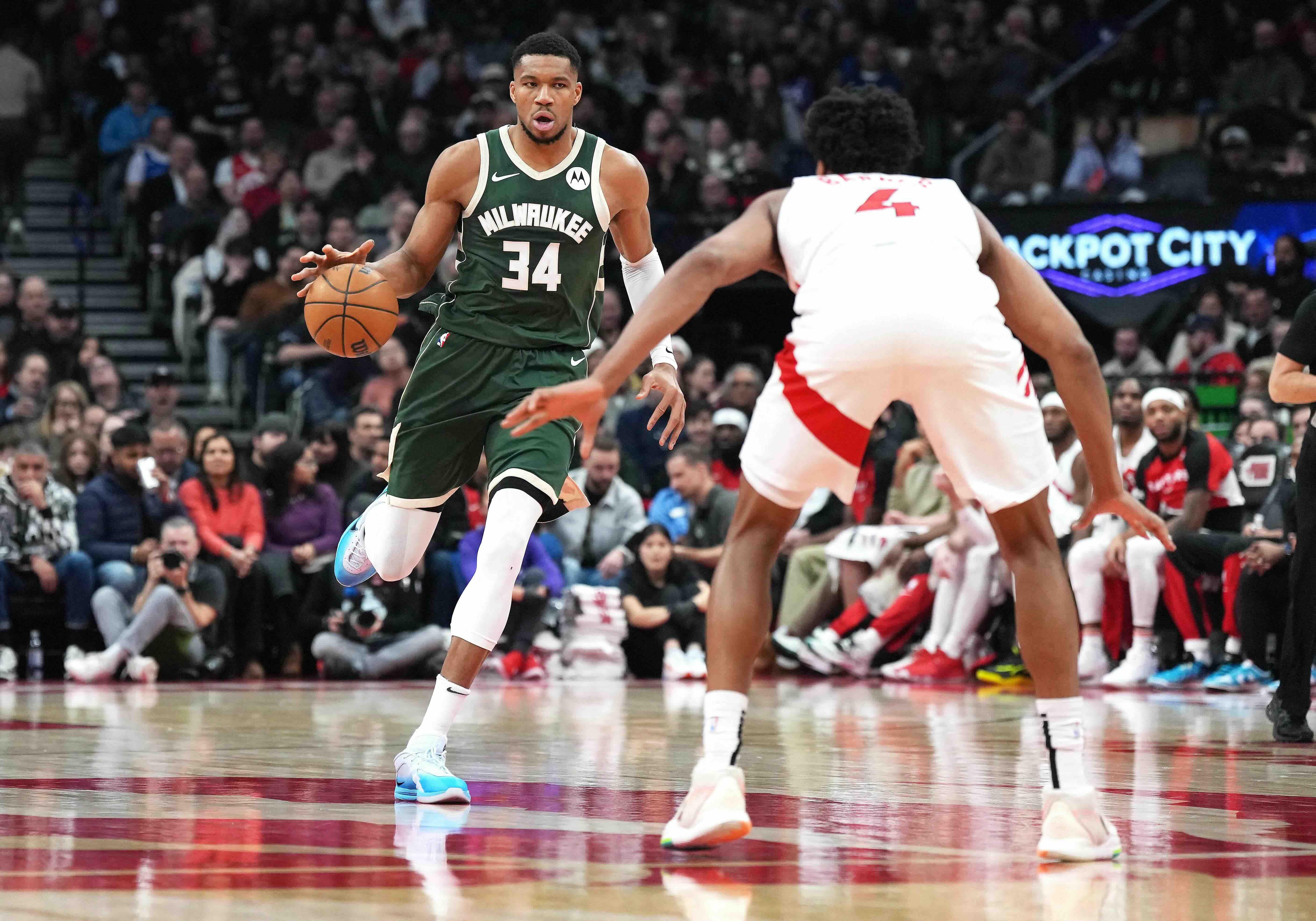 NBA: Giannis Antetokounmpo's triple-double leads Bucks' rout of Raptors