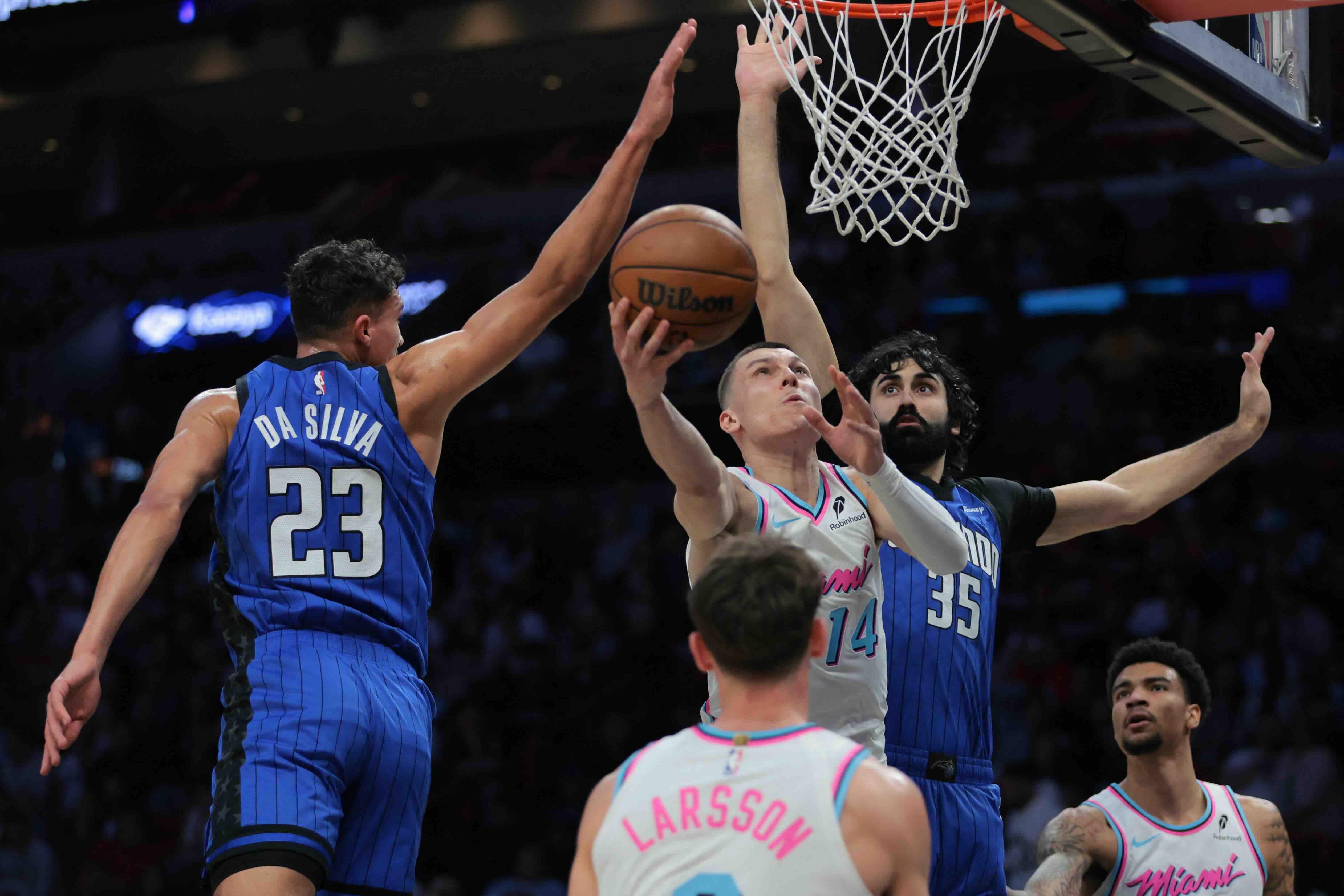 NBA: Sans Jimmy Butler, Heat edge Magic in double OT