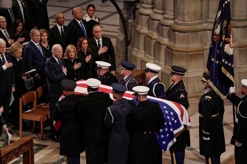 Jimmy Carter briefly unites US as presidents attend funeral
