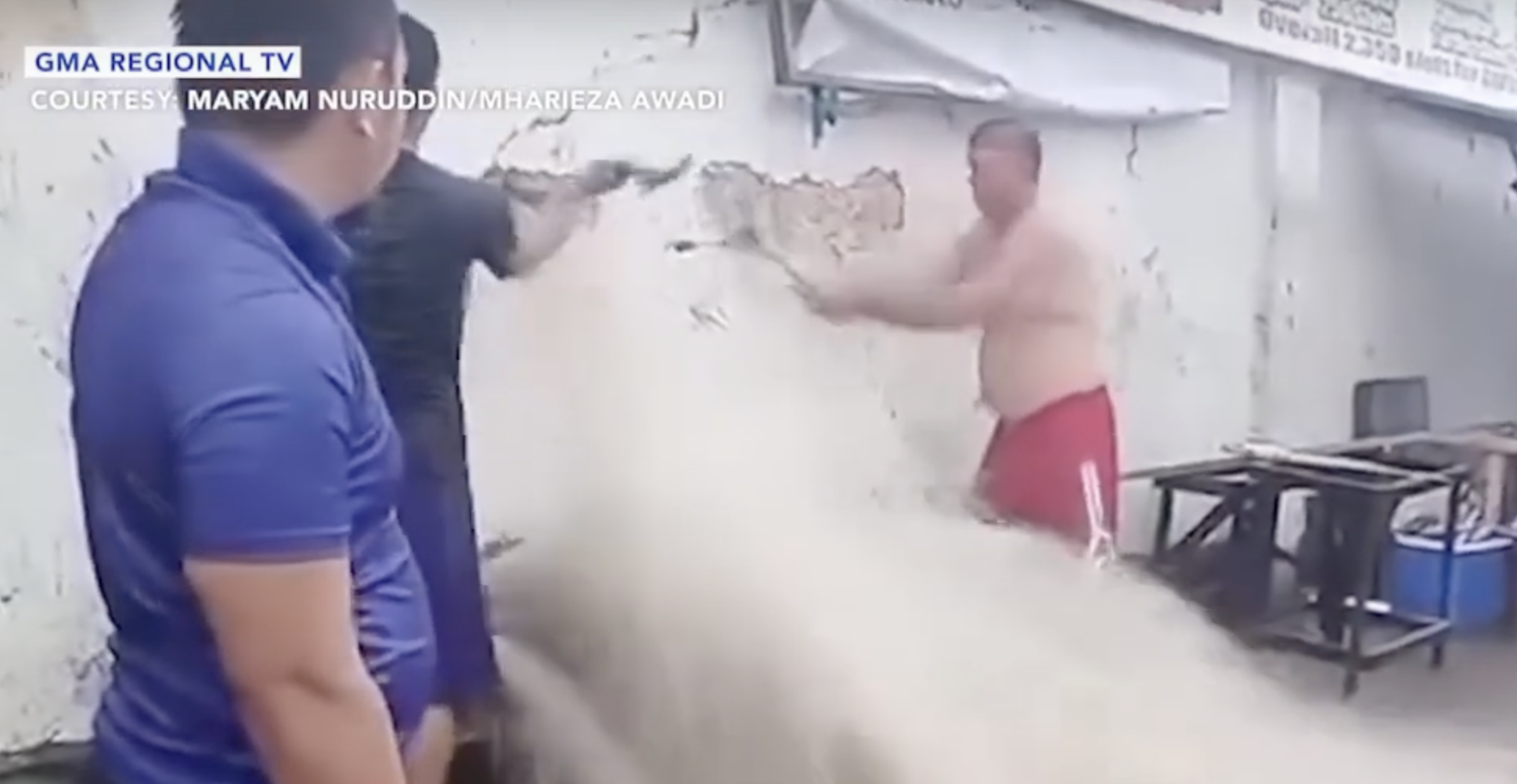 Residents break wall to release flood waters in Tawi-Tawi