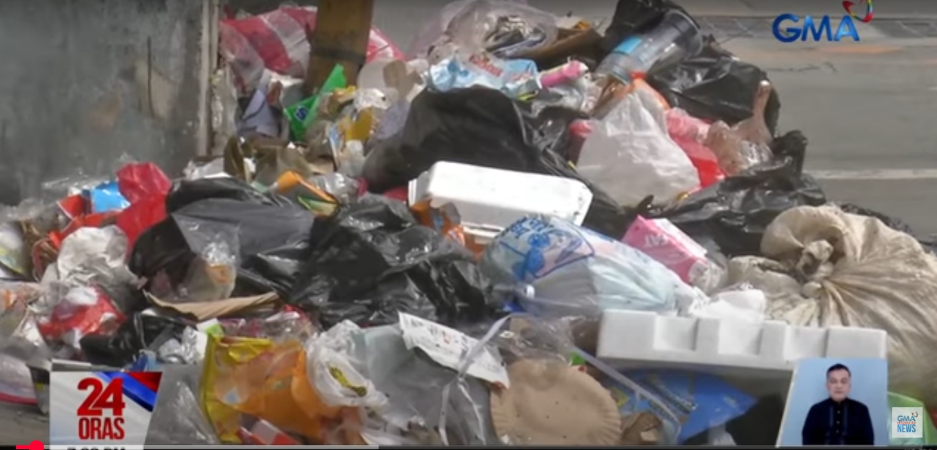 Garbage piles remain uncollected in Manila