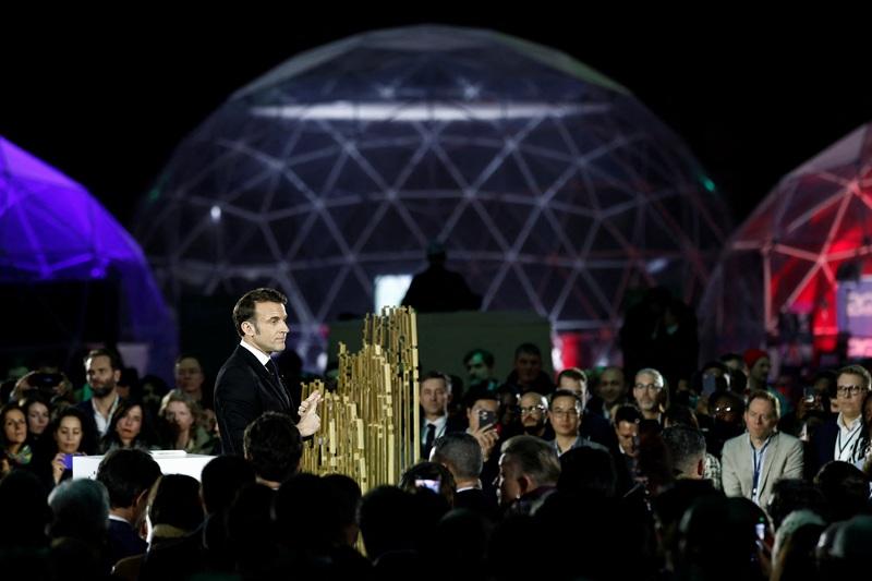 Macron invites international scientists to come work in France