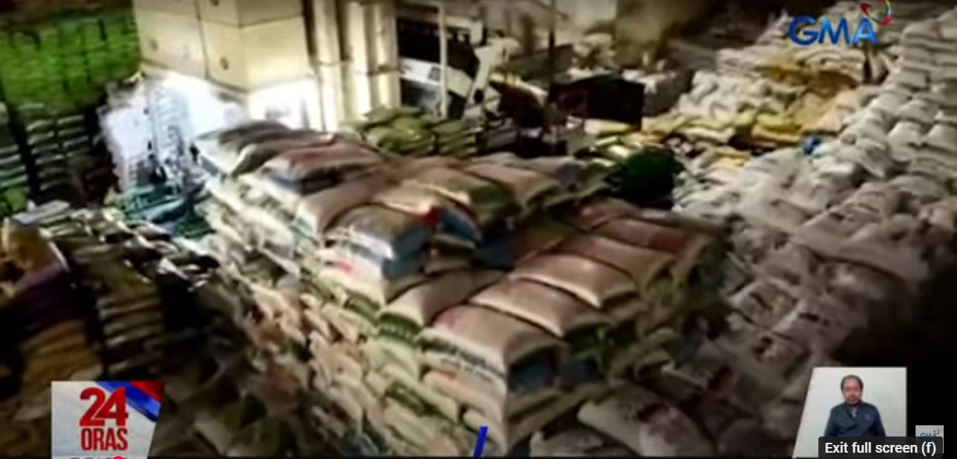 NBI raids warehouse allegedly hoarding old imported rice