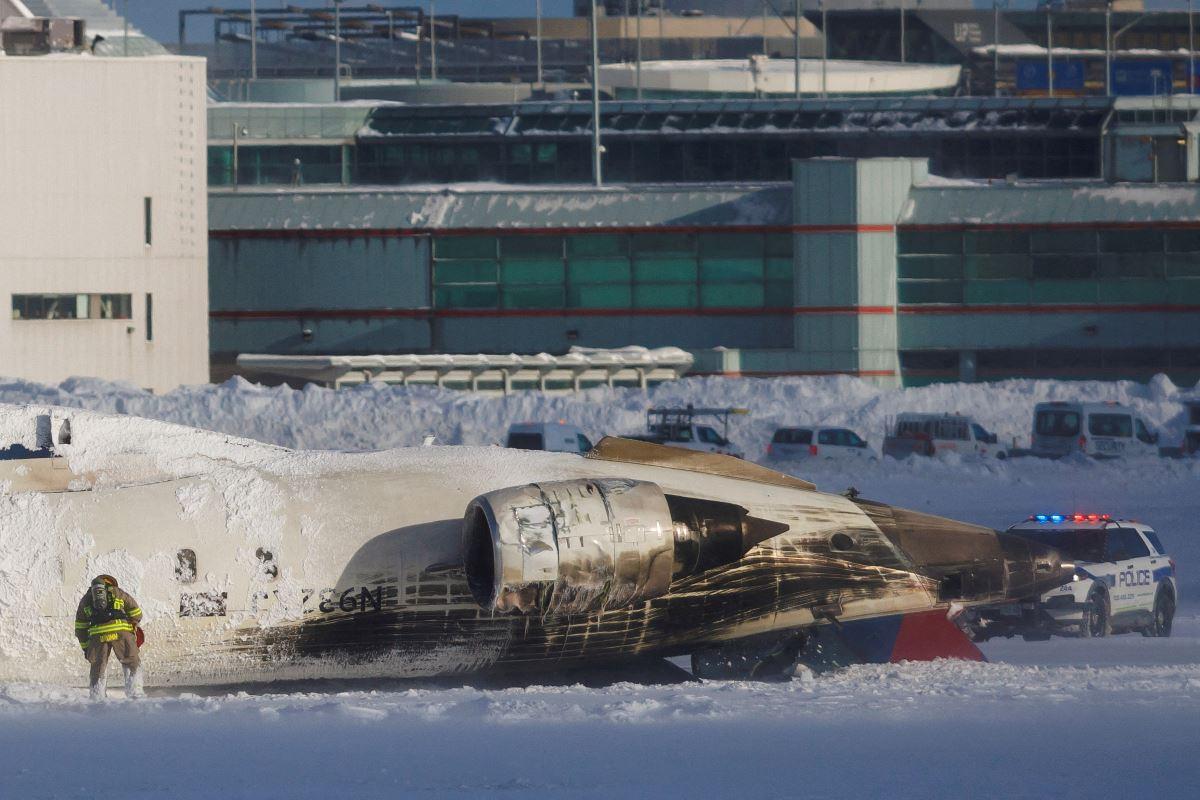 Delta plane flips upside down on landing at Toronto airport, injuring 18