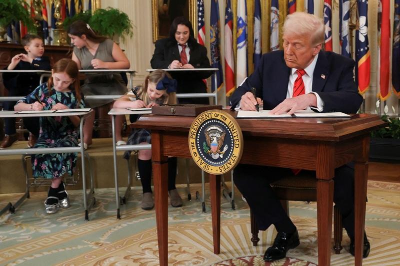 Trump signs order aimed at dismantling US Department of Education