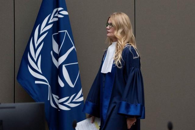 ICC presiding judge Iulia Antoanella Motoc enters the courtroom where former Philippine President Rodrigo Duterte appeared via video link before the International Criminal Court (ICC) in The Hague, Netherlands. Peter Dejong/Pool via REUTERS