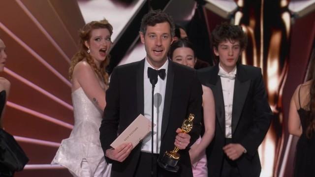 'AnoraAlex Coco receives the Oscar for Best Picture. Photo courtesy of The Academy