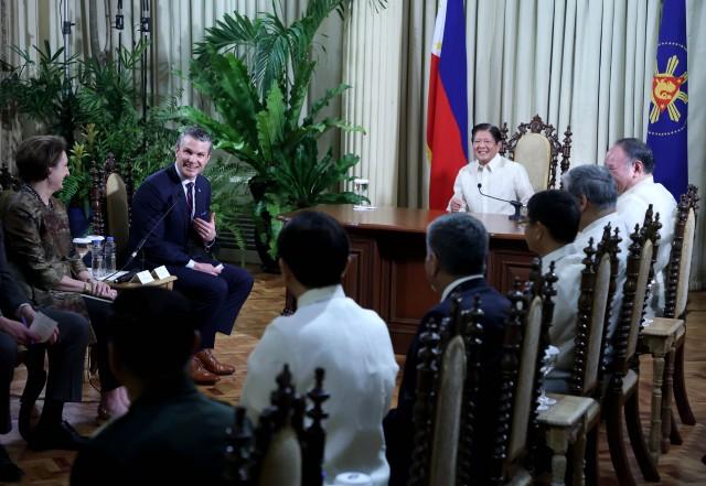 President Ferdinand R. Marcos Jr. welcomes U.S. Secretary of Defense Pete Hegseth during a courtesy call at Kalayaan Hall, MalacaÃ±an Palace, on March 28, 2025. YUMMIE DINGDING / PPA POOL