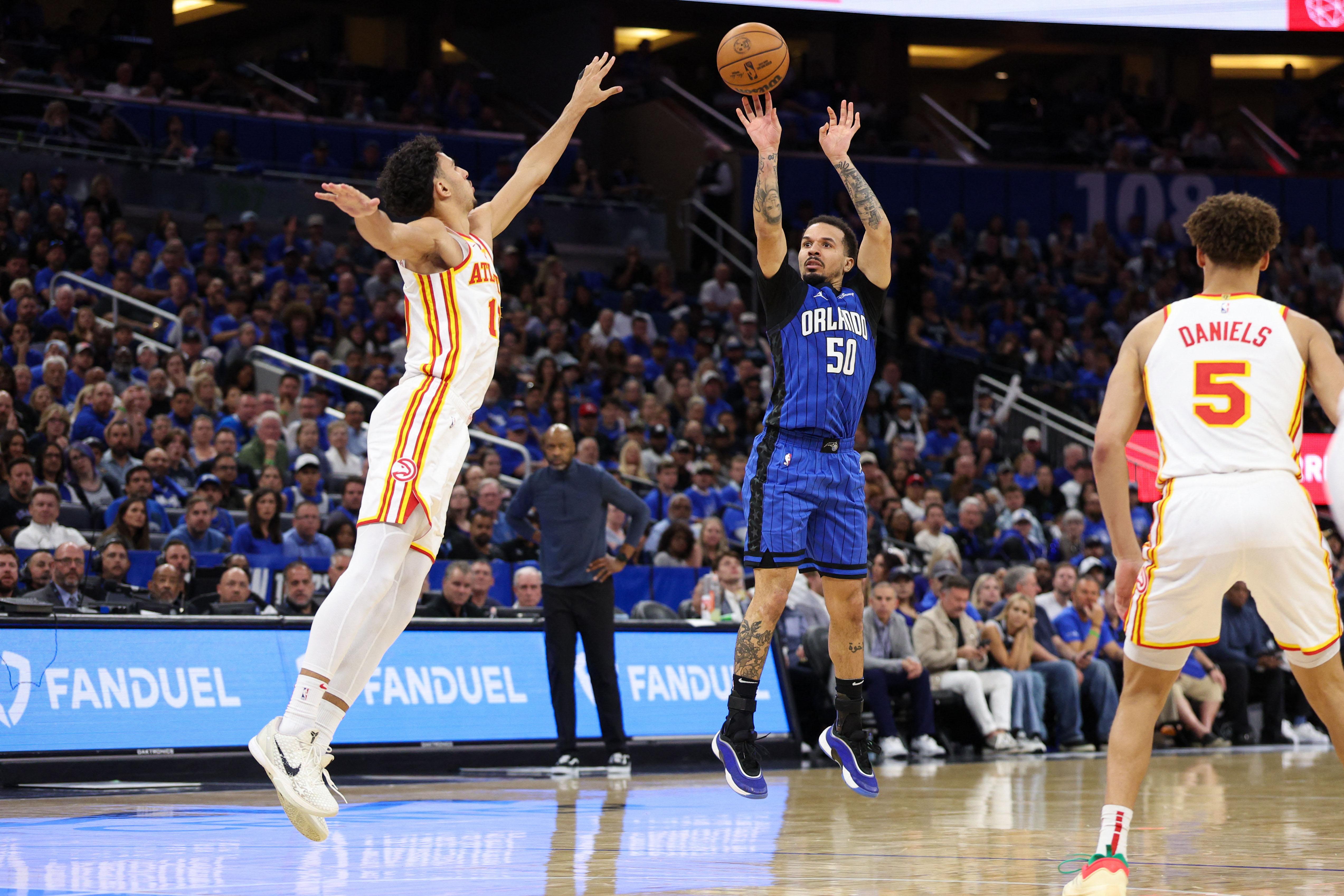 NBA: Magic pull away from Hawks, earn playoff date with Celtics