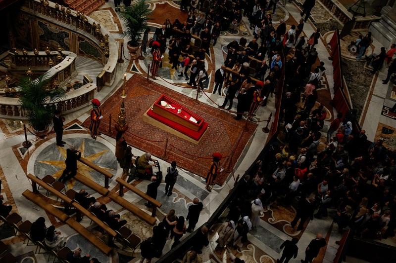 Crowds wait for hours to pay final respects to Pope Francis at St. Peter's
