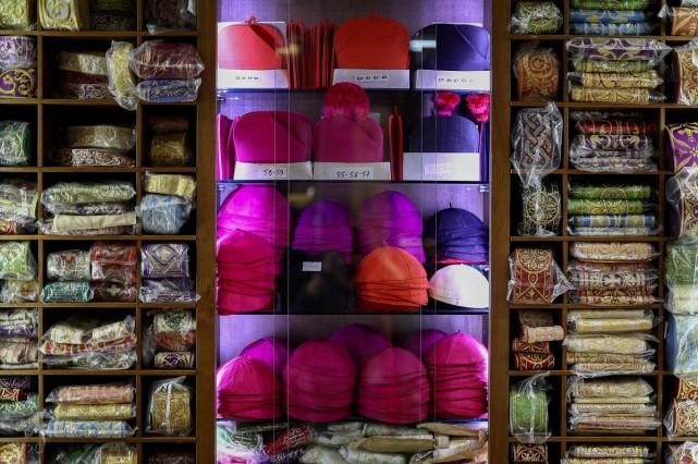 Liturgical vestments are on sale at Raniero Mancinelli liturgical vestments shop near the Vatican, in Rome, Italy, April 29, 2025. REUTERS/ Guglielmo Mangiapane